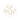 A flat-lay image of twelve gold necklaces, each featuring a zodiac sign name in Old English-style font. The necklaces are arranged in a circular pattern on a white background, with each name—such as Aries, Scorpio, Taurus, and Gemini—clearly visible on its own chain.