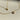 Two elegant gold necklaces featuring a diamond heart pendant, showcasing a blend of luxury and romance.