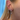 Ear stack featuring silver huggie hoops with moon and star charms, crystal studs, and chain drop earrings worn on multiple piercings