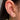 Gold double chain earring with pink heart and crystal studs paired with a dainty gold hoop on lobe piercings