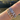 Gold and silver BINKY BELLE custom crystal name bracelets sparkling in natural light by the riverside – personalised jewellery UK