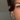 Double hoop gold earrings with pavé crystal detailing styled on model with sleek updo and natural glam makeup