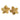 A pair of gold-colored floral stud earrings with no visible brand marking, photographed on a white background.