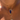 Necklace with fish-shaped charms on a person's neck