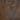 A close-up of layered necklaces on a woman's neck, featuring a silver tennis choker, a gold nameplate necklace that says “Natalia” with pearl accents, and a silver rope chain with a detailed silver flower pendant.