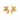Pair of gold leaf-shaped earrings on a white background