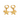 Gold hoop earrings with starfish and pearl charms on a white background