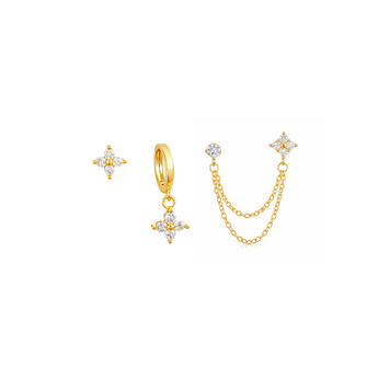 Gold earring set with clover-shaped designs on a white background