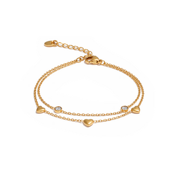 Gold bracelet with heart-shaped charms on a white background