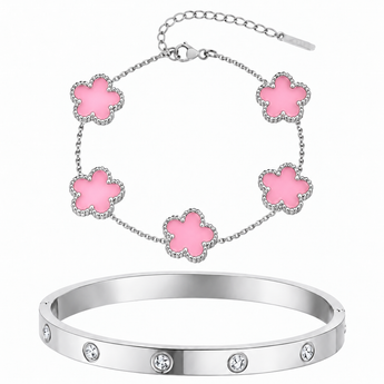 A jewelry set featuring a silver-toned bangle bracelet with clear rhinestones and a matching delicate chain bracelet with five pink flower charms outlined in silver-toned metal, shown on a plain white background.