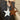 Star-shaped keychains with initials on a patterned surface. Bah charm