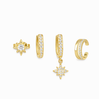 Set of gold earrings including star-shaped and hoop designs on a white background