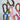 Six braided rope bracelets with gold-tone metal nameplates spelling 'LOVE' are arranged on a white surface. The bracelets are in brown, blue, pink, and red, with some showing white marbling in the braid.