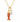 Gold necklace with a red fish charm and diamond pendant on a white background