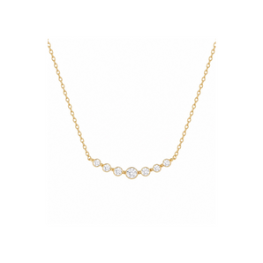 A delicate yellow gold chain necklace featuring a curved bar with five small, bezel-set clear round gemstones, displayed against a solid white background.