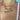 Close-up of a woman wearing two balloon-style letter necklaces. The top gold necklace spells “NATALIA,” and the lower silver necklace spells “BINKY BELLE.” She is wearing a white swimsuit with red scalloped trim near a poolside setting.