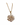Golden necklace with a pendant shaped like a sparkling flower, featuring intricate patterns and glittering stones, conveying elegance and sophistication.