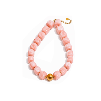 Pink beaded bracelet with a gold clasp on a white background
