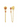 Gold earrings with red gemstones on a white background
