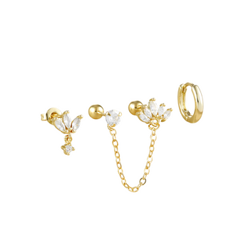 Set of gold earrings including a chain earring, stud earrings, and hoop earrings on a white background.