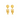 Gold lobster shell stud earrings placed on a white background
