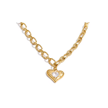 Gold chain necklace with a heart-shaped pendant on a white background