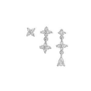 Pair of silver star-shaped earrings on a white background