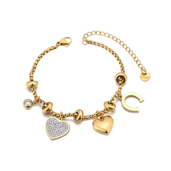 Gold bracelet with heart-shaped charms on a white background