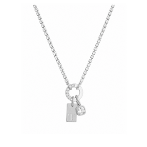A silver box chain necklace featuring a circular charm set with small clear stones, a rectangular initial 'T' charm, and a small round crystal pendant, shown on a plain white background.