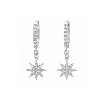 A pair of silver huggie hoop earrings with a row of clear pavé stones and a dangling eight-pointed starburst charm, set against a plain white background.