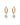 Gold hoop earrings with embedded small crystals, each featuring a dangling heart-shaped clear gemstone, reflecting elegance and sophistication.