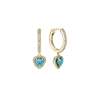 pair of gold earrings with blue crystals inside and placed on a white background
