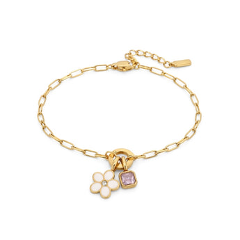 Gold bracelet with floral and heart charms on a white background