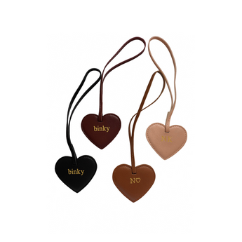 Heart-shaped keychains with 'binky' and 'N' branding on a white background